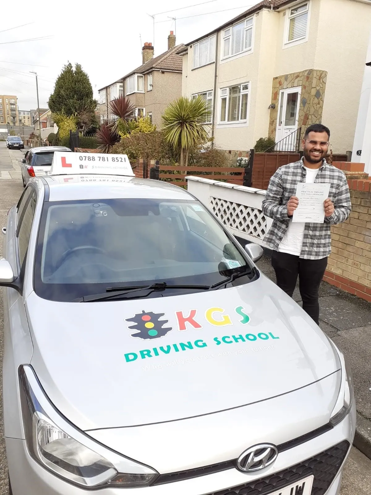 Pupil from Belvedere celebrating his driving test pass with KGS Driving School